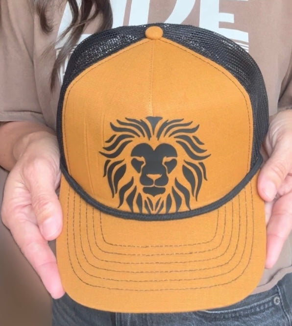 Lion Head on Caramel and Black Trucker Hat with with black bill rope